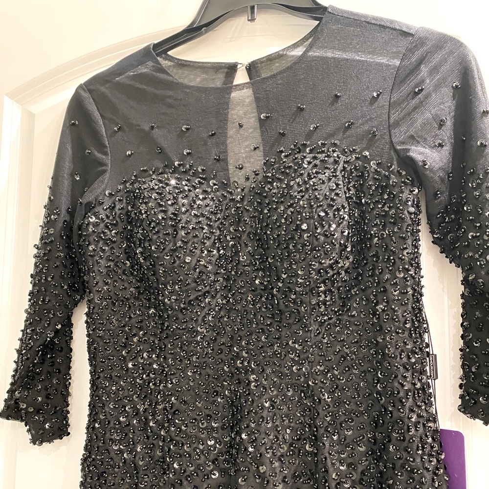 Brand new beautiful dress with beading detail